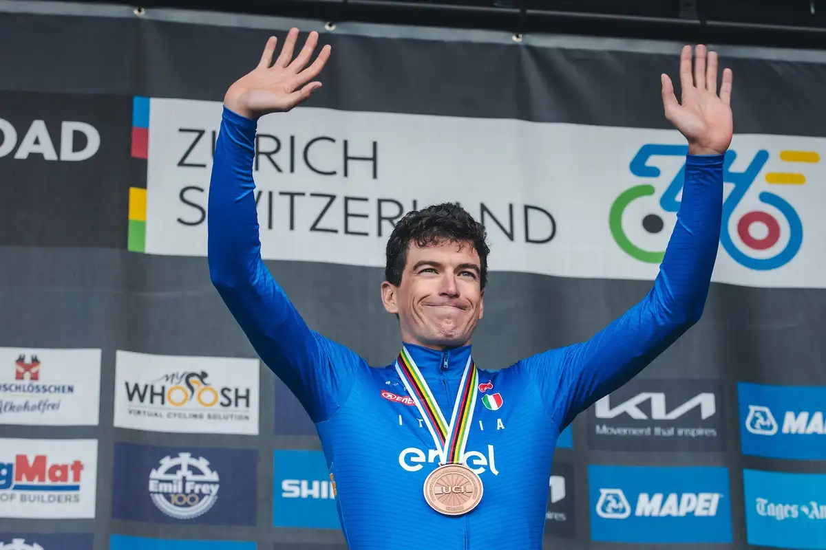 Christophe Laporte of Team Visma | Lease a Bike holding a medal at an international cycling event.
